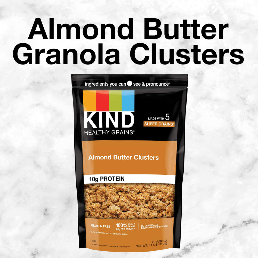 Pouring KIND Almond Butter Granola into a bowl with milk for easy breakfast