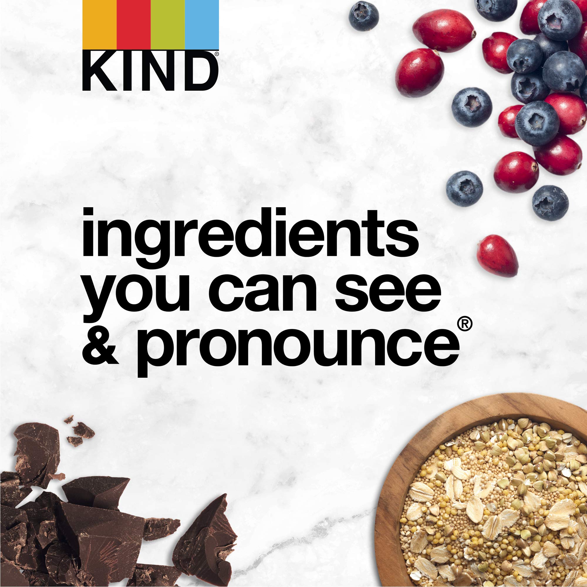 KIND Raspberry Granola with chia seeds sprinkled over yogurt for texture and fiber.