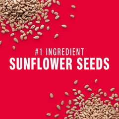 Plant-based oat milk drizzle atop a KIND Seeds bar