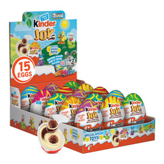 Kinder Joy Easter egg split sides with treat and toy inside for Easter fun.