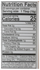 KINDER'S Organic Buttery Buffalo Wing Sauce pour shows creamy glaze on foods.