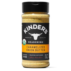 Kinder's Organic Caramelized Onion Butter on a burger patty for savory-sweet grilling flavor.