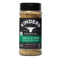 KINDER'S Organic Garlic and Herb seasoning bottle with sea salt and lemon aroma enhances meals.