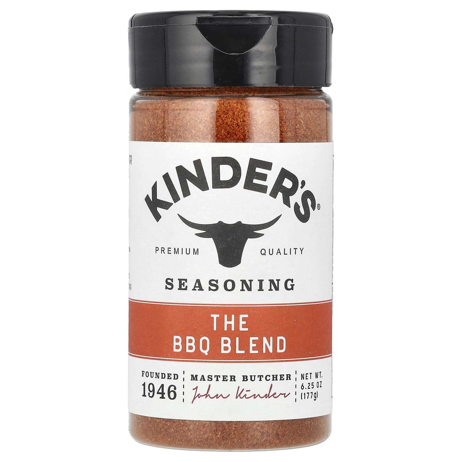 Kinder's Rub The BBQ Blend jar on a wooden table for seasoning.