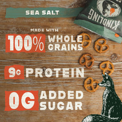 Kindling Protein Pretzels Sea Salt on a snack plate, ideal for office or school snacks.