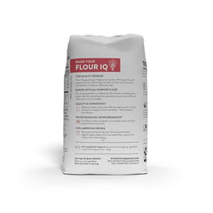Flour-dispensing scoop with King Arthur flour for easy measuring