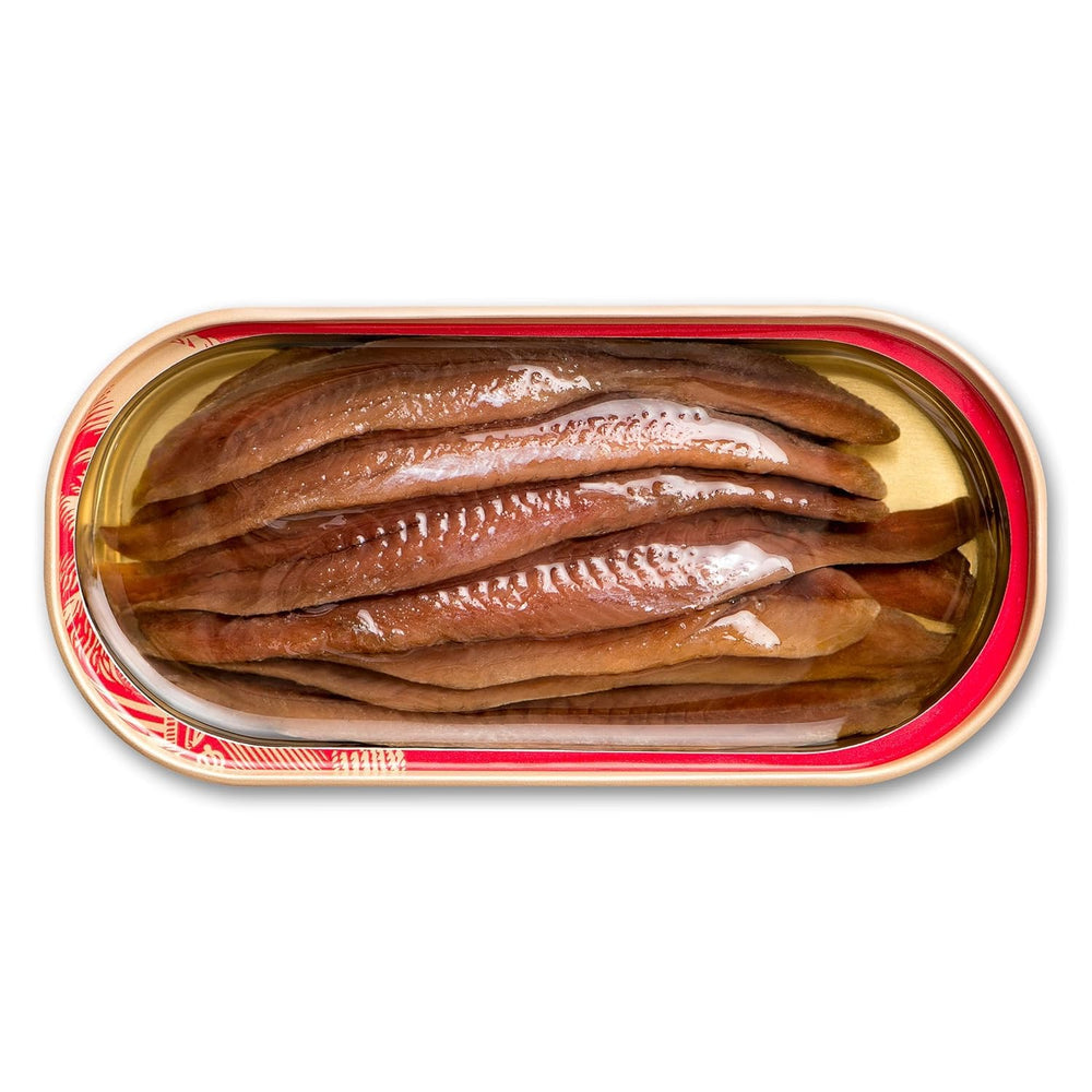 King Oscar anchovies in olive oil close-up with delicate fillets.