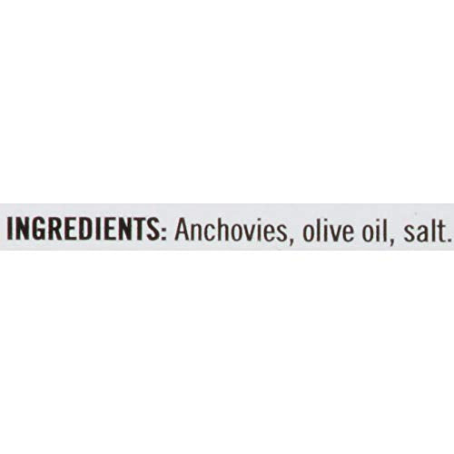 King Oscar anchovies olive oil in kitchen scene.