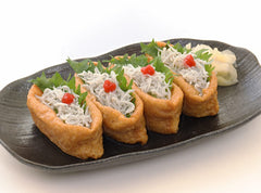 KINJIRUSHI BRAND Umeboshi paste on sushi platter for tangy accent.