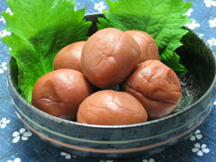 Shiso leaves detail on Kinjirushi Umeboshi paste for color and aroma.