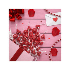 Hershey's Kisses closeup-center emphasizes creamy center and berry-inspired flavor.