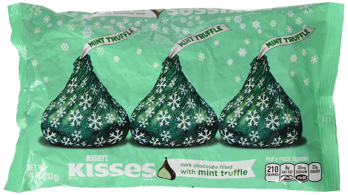 Kisses Holiday Dark Chocolate with Mint Truffle in festive green wrappers, ideal for celebrations and gifting.