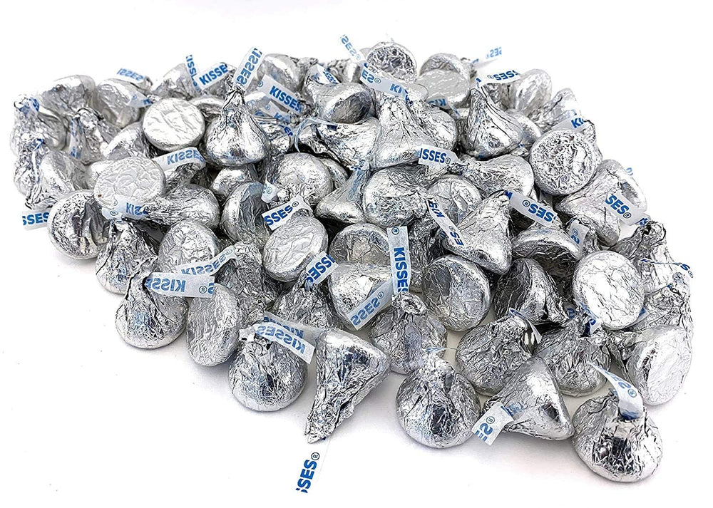 KISSES displayed at a party table, ideal for celebrations.