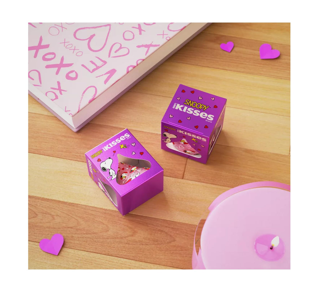 Kisses peanuts characters design box art emphasizes collectible keepsake packaging.