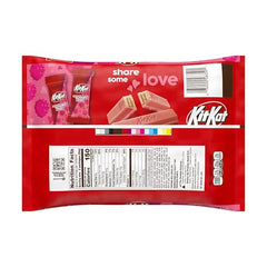 Kit Kat raspberry creme wafer close-up shows creamy filling and crispy texture, great for indulgent snacking