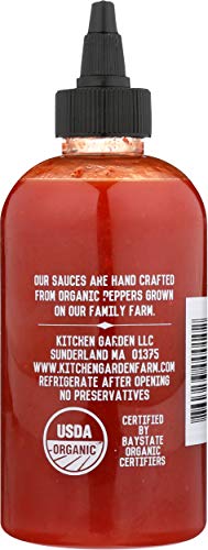 Kitchen and Garden Organic Sriracha on eggs for extra savory kick.