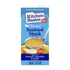 Kitchen Basics Original Seafood Stock bottle pour highlighting rich flavor for paella and seafood stews