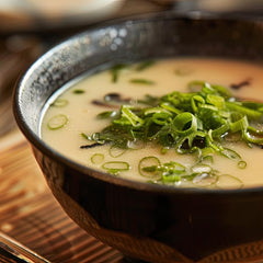 Bowl of ramen with rich Kitchen Kurume Tonkotsu broth