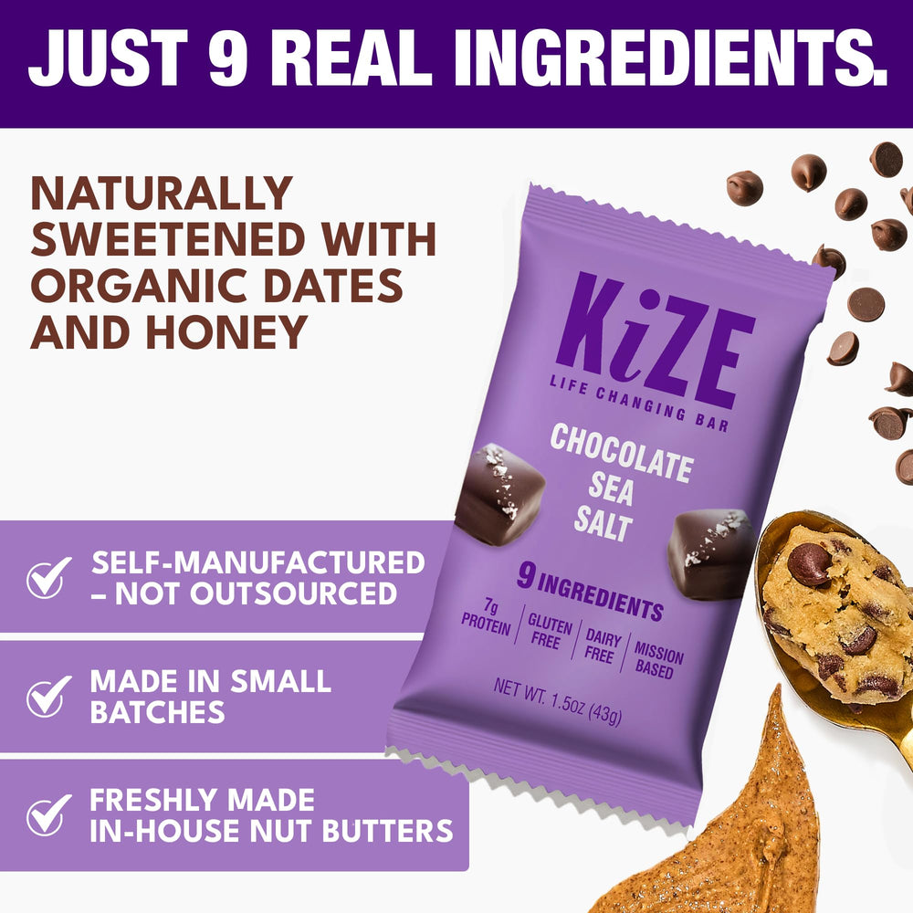 KiZE Energy Bar Chocolate Sea Salt bar held in hand for a convenient snack on busy days.