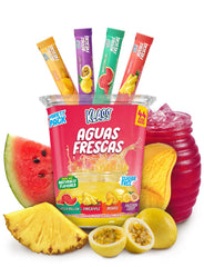 Klass Aguas Frescas mango flavor stick packet beside water for on-the-go hydration.