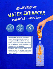 Klass Aguas Frescas pineapple-tangerine drops added to water.