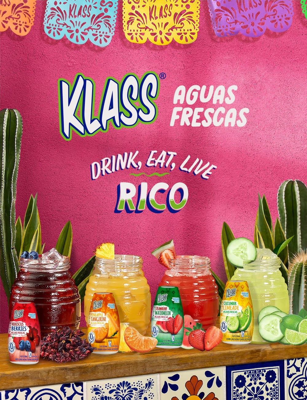 Klass Aguas Frescas flavor drops coloring a glass of water.