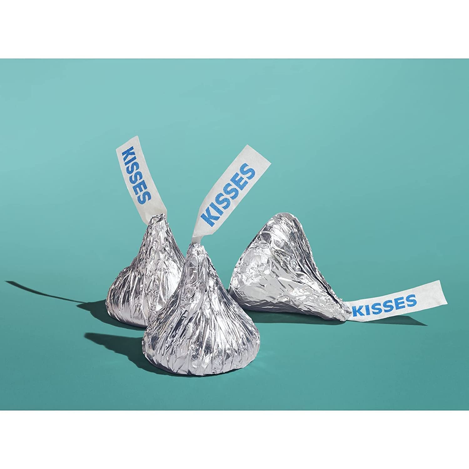 KLICKERS candies in green-silver foil displayed on a serving tray for parties