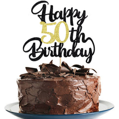 Klionjor 50th birthday topper on a black-gold cake for milestone photos