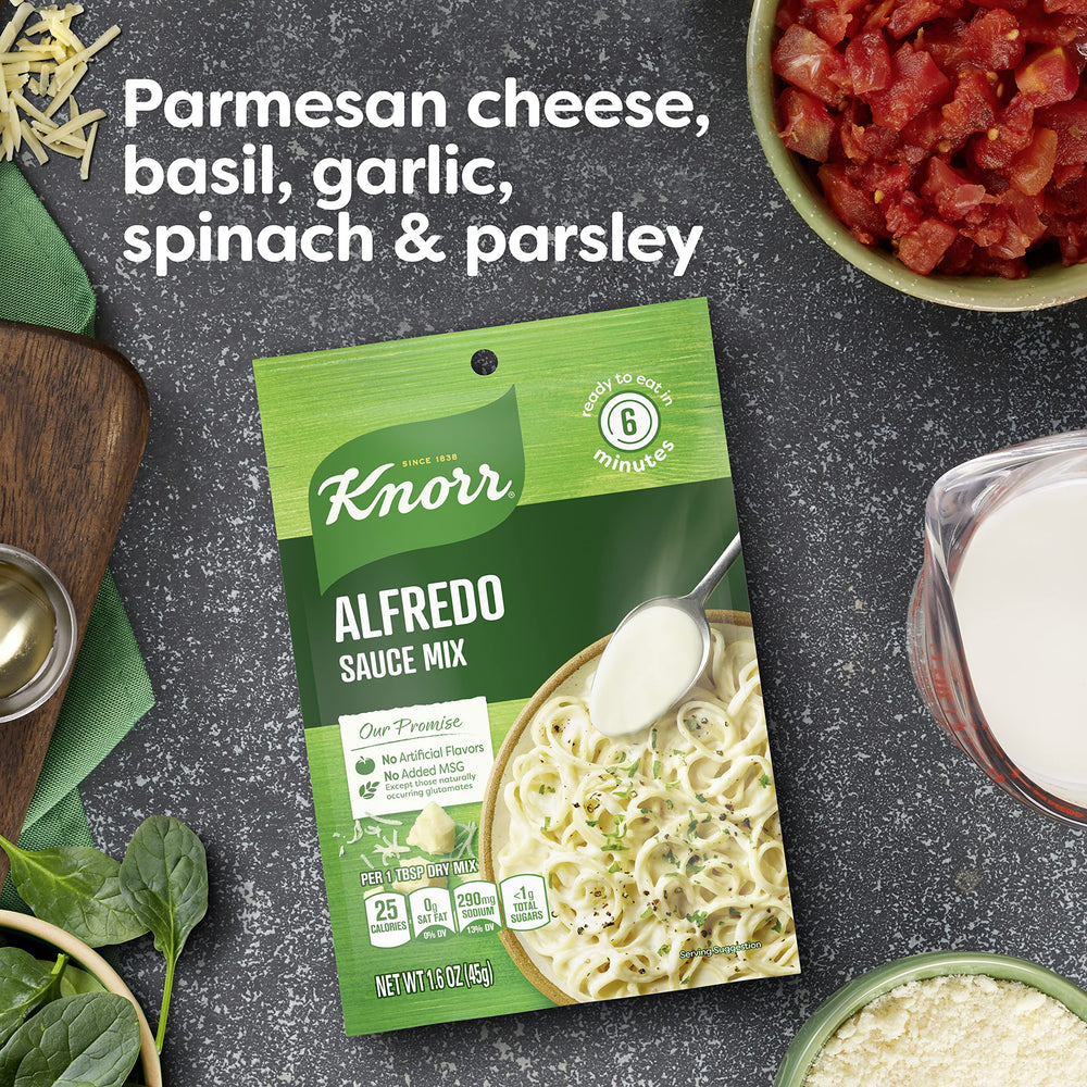 Knorr Alfredo Sauce Mix simmering on the stove to create velvety sauce.