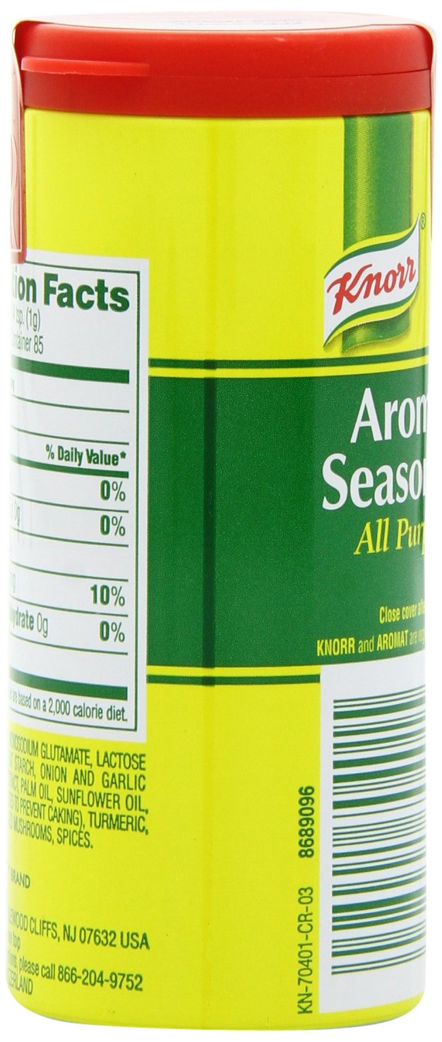 Compact kitchen setup with Knorr Aromat Seasoning in a spice rack.