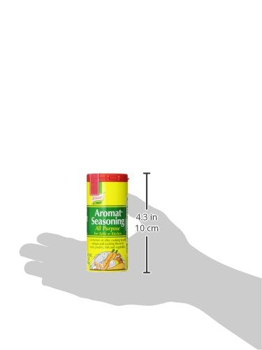 Pouring Knorr Aromat over grilled meat for quick flavor boost.