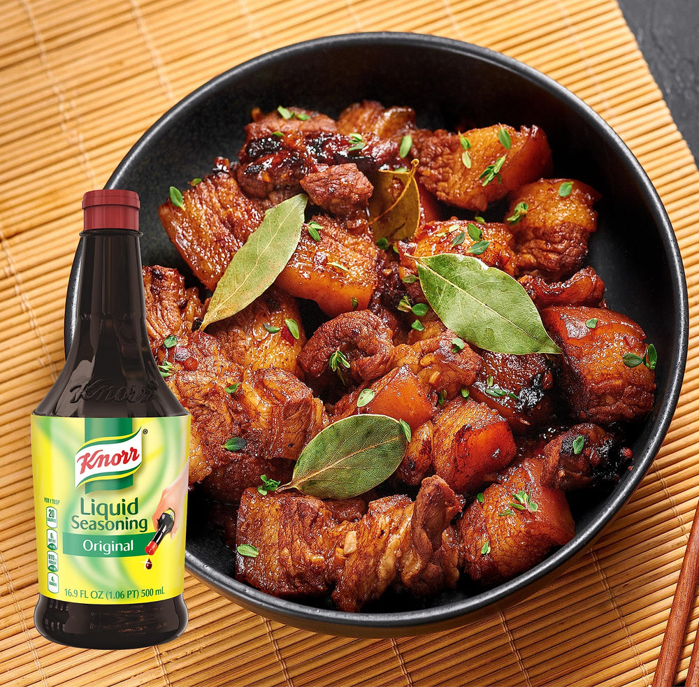 Pouring Knorr Liquid Seasoning Original adds savory depth to stir-fries and stews.