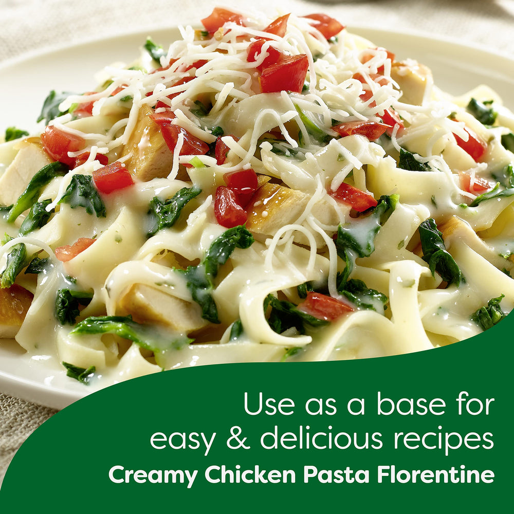 Serving bowl of butter fettuccine, a reliable side for family meals.