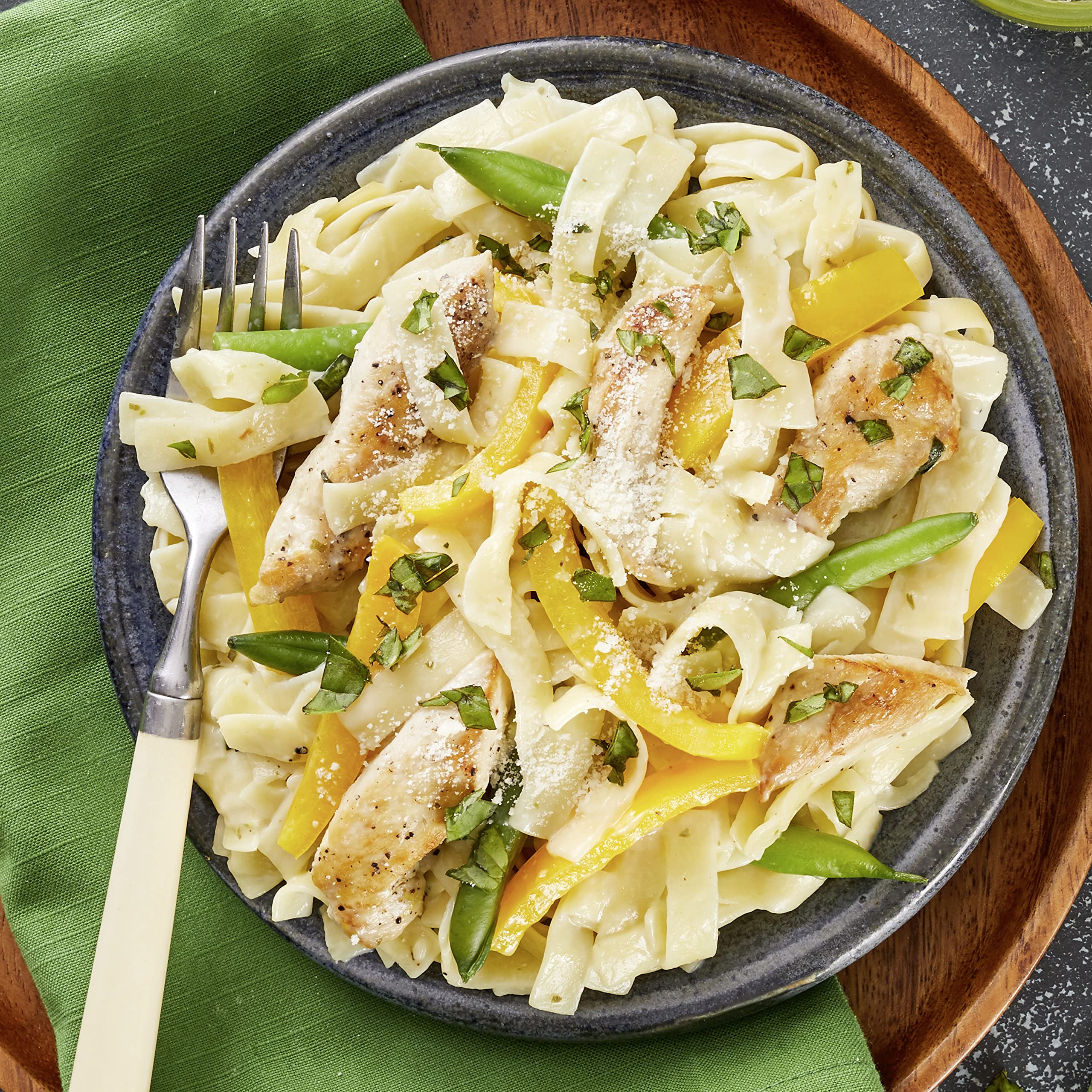 Knorr prepared parmesan pasta side served with veggies and protein.