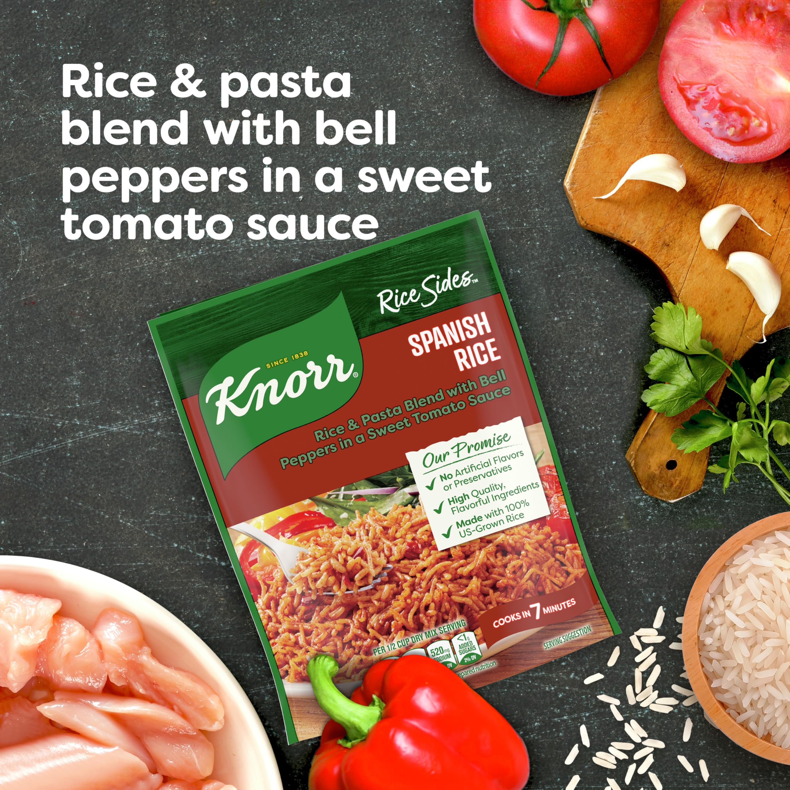Stovetop cooking scene with Knorr Rice Sides Spanish Rice in a pot.