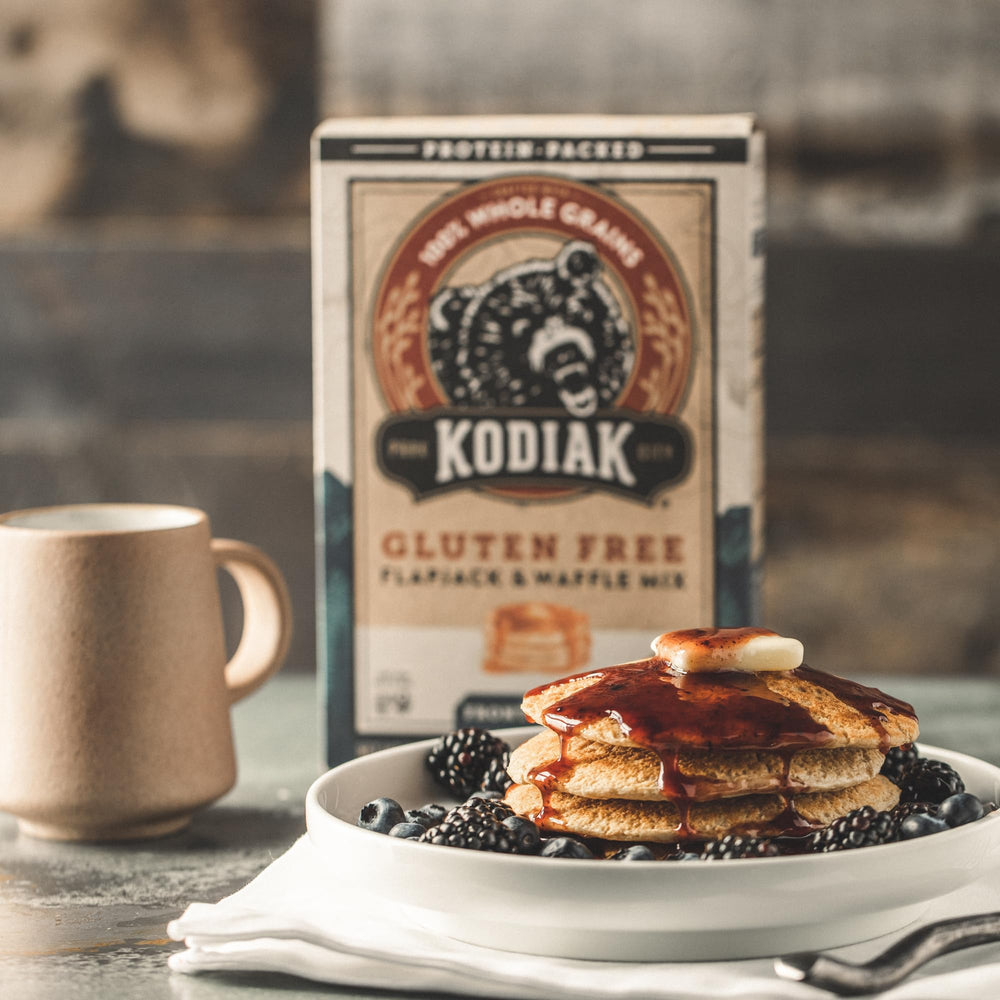 Kodiak Cakes Frontier oat pack close-up, nine servings per container for weekend meal planning.