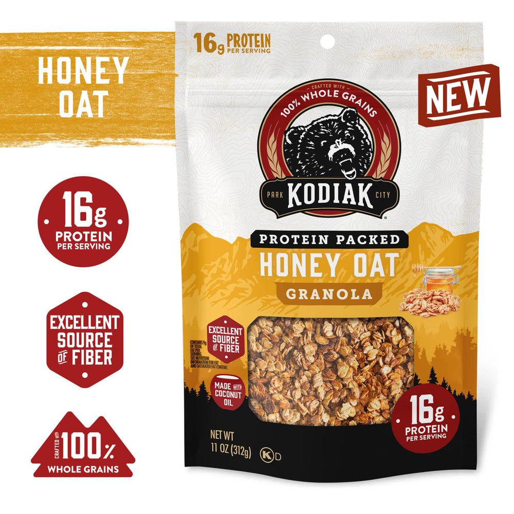 Kodiak Cakes Honey Oat Granola being poured shows quick, on-the-go crunch.
