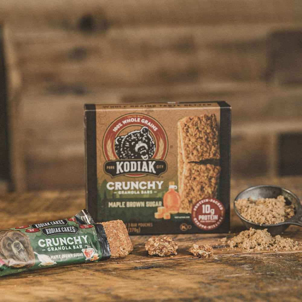 Kodiak Cakes crunchy granola bars box with six pouches demonstrates easy portioning for trails.