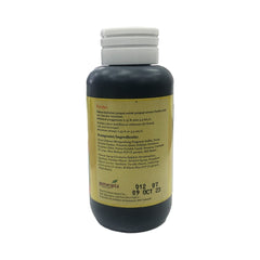 Koepoe Koepoe Pandan Flavoring Paste close-up reveals smooth texture for mixing.