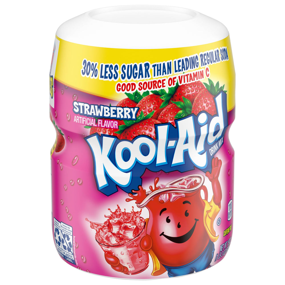 Work desk setup with Kool-Aid Strawberry mix for a quick pick-me-up