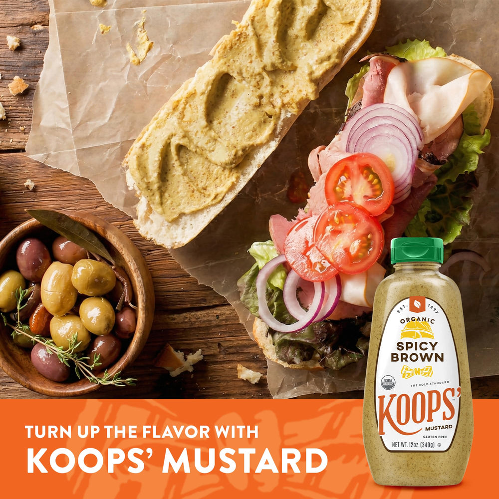 Koops' mustard on a burger adding a tangy kick