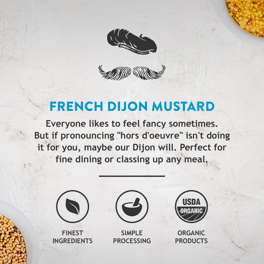 KOOPS' Organic Dijon Mustard on a sandwich elevating lunch flavor.