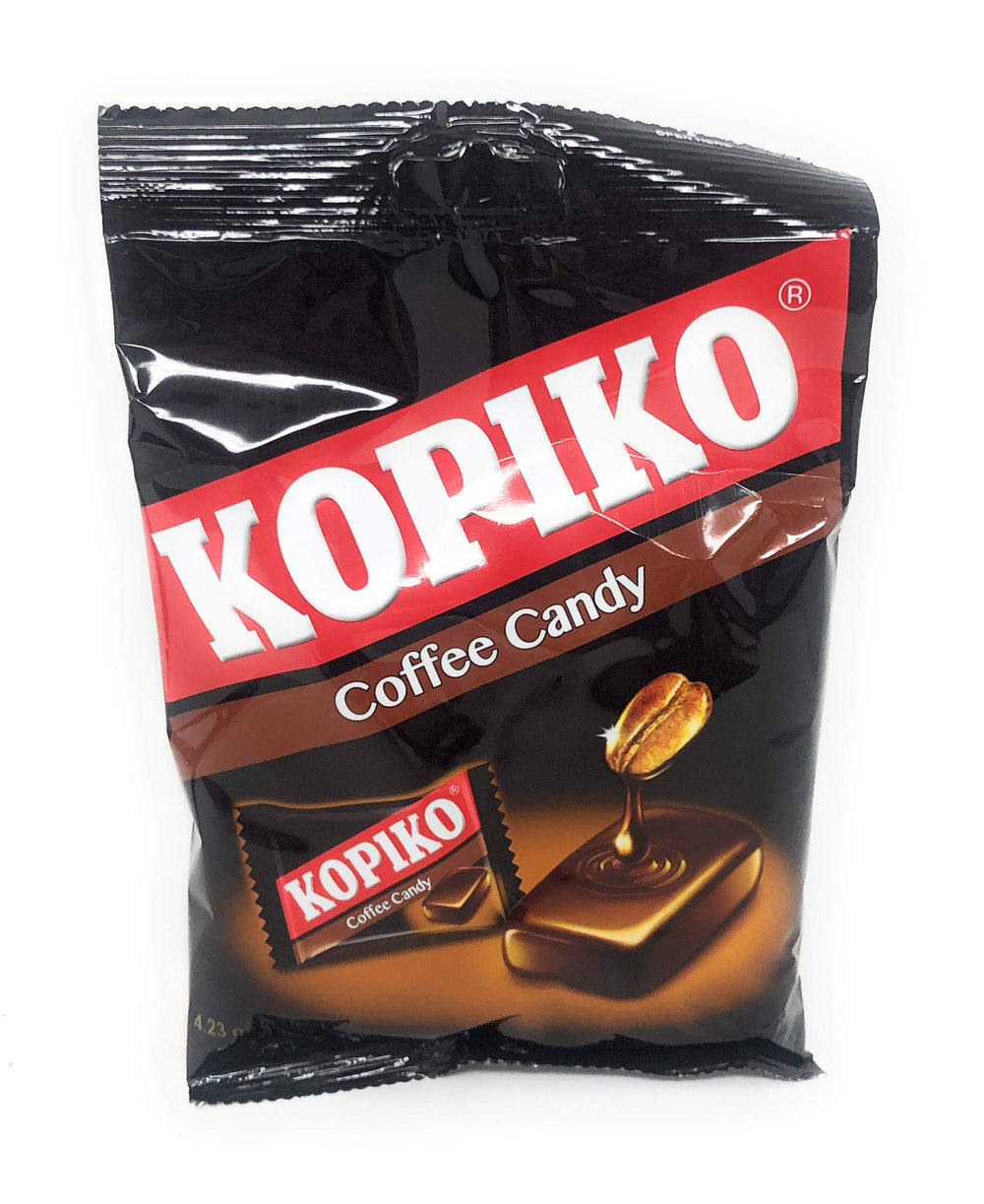 Kopiko coffee candy held in hand, ready for a quick pick-me-up.