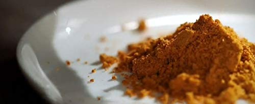 Korean Noodle Soup Powder closeup highlights rich, spicy flavor.