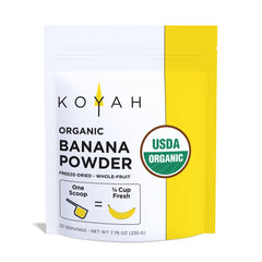 KOYAH Organic Banana Powder bottle on a kitchen counter for smoothies.
