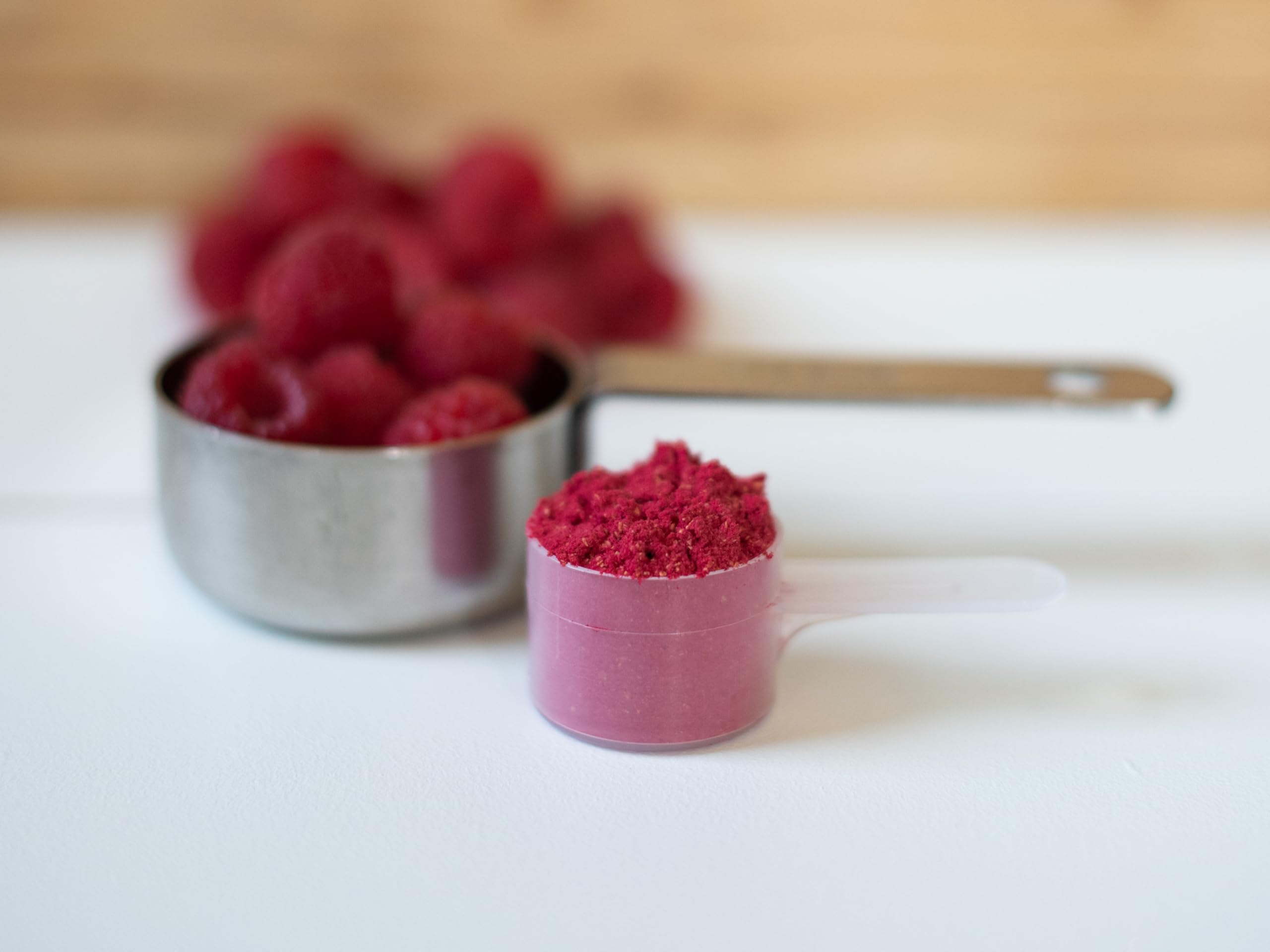 KOYAH raspberry powder in a smoothie bowl for quick flavor boost