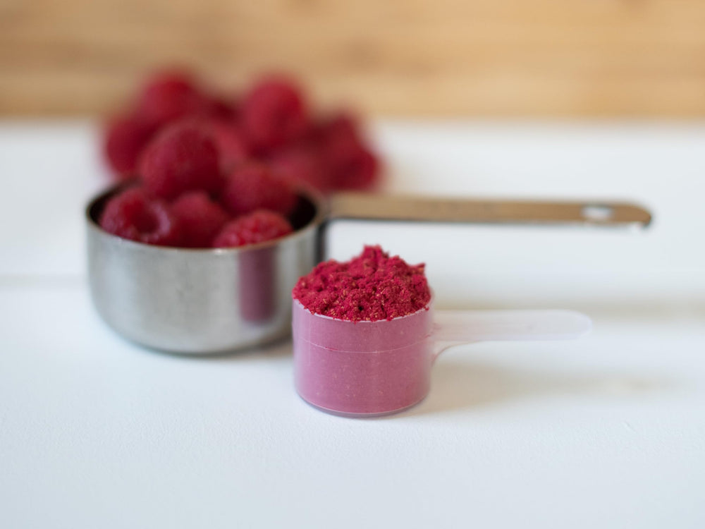 KOYAH raspberry powder in a smoothie bowl for quick flavor boost