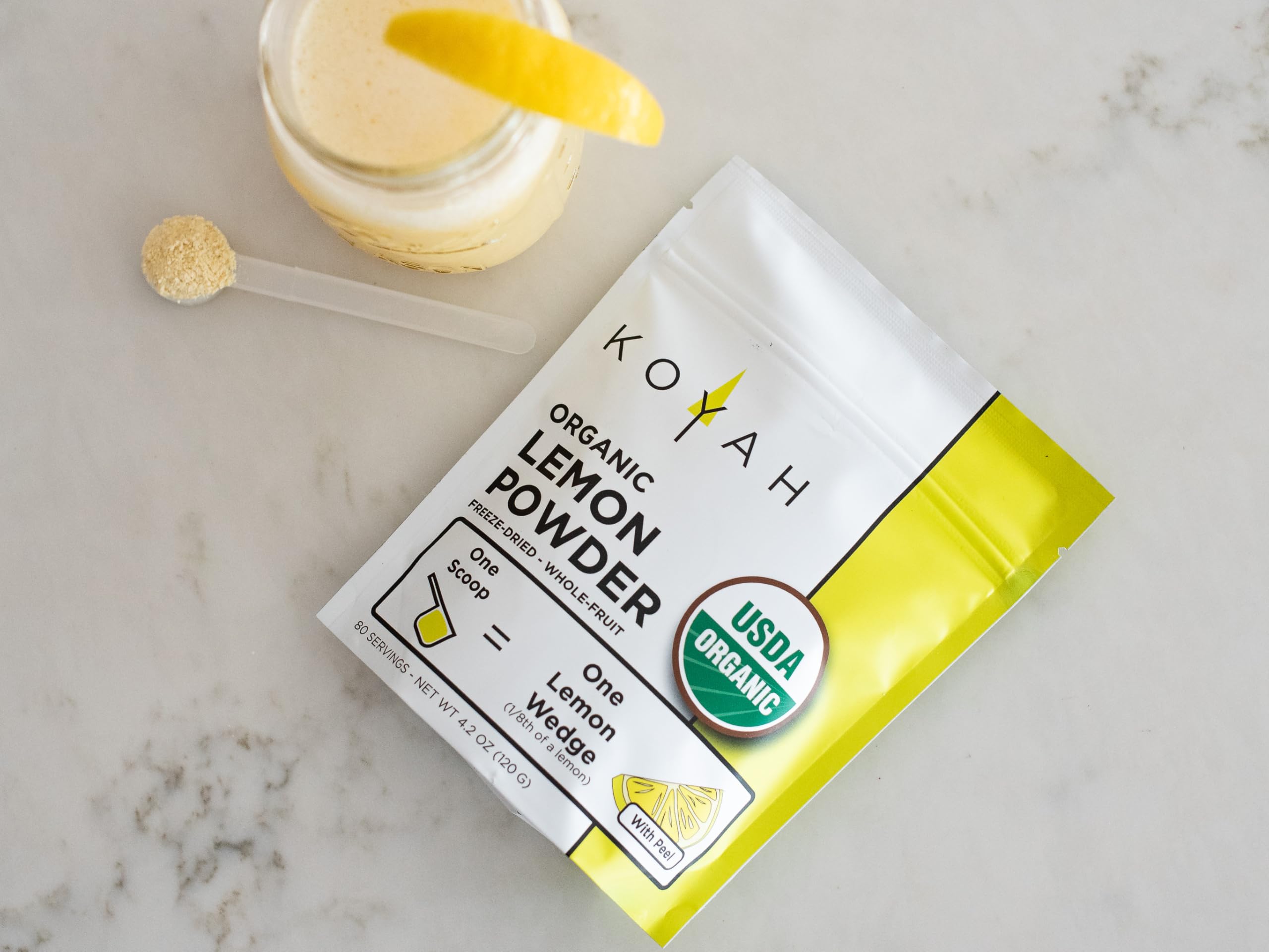 KOYAH Organic Lemon Powder with Peel label, showcasing USA & Mexico grown lemons.