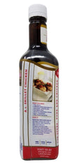 Kraft A1 Original Sauce bottle being poured over steak for flavor boost