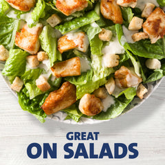 Kraft Caesar dressing bottle with applicator top for precise portion control.